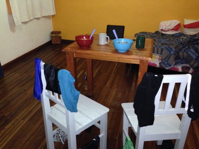 A little glimpse into our glamorous hostel life: laundry drying on the chair, pasta dinner and iPad show.