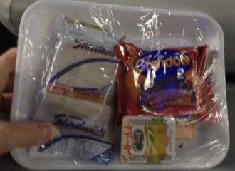 This particular bus breakfast had cookies, crackers and jam. Never thought we'd miss the ham until that moment.